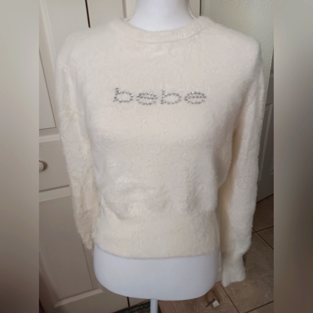 Bebe Fuzzy White Rhinestone Logo Sweater. Size L.